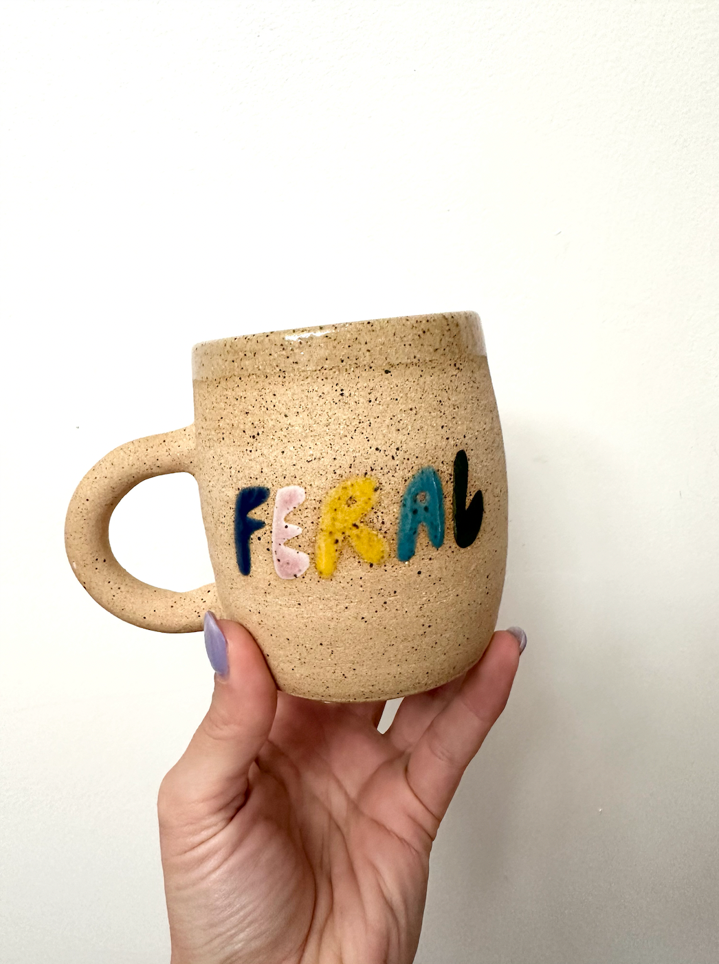"F-E-R-A-L" Mug