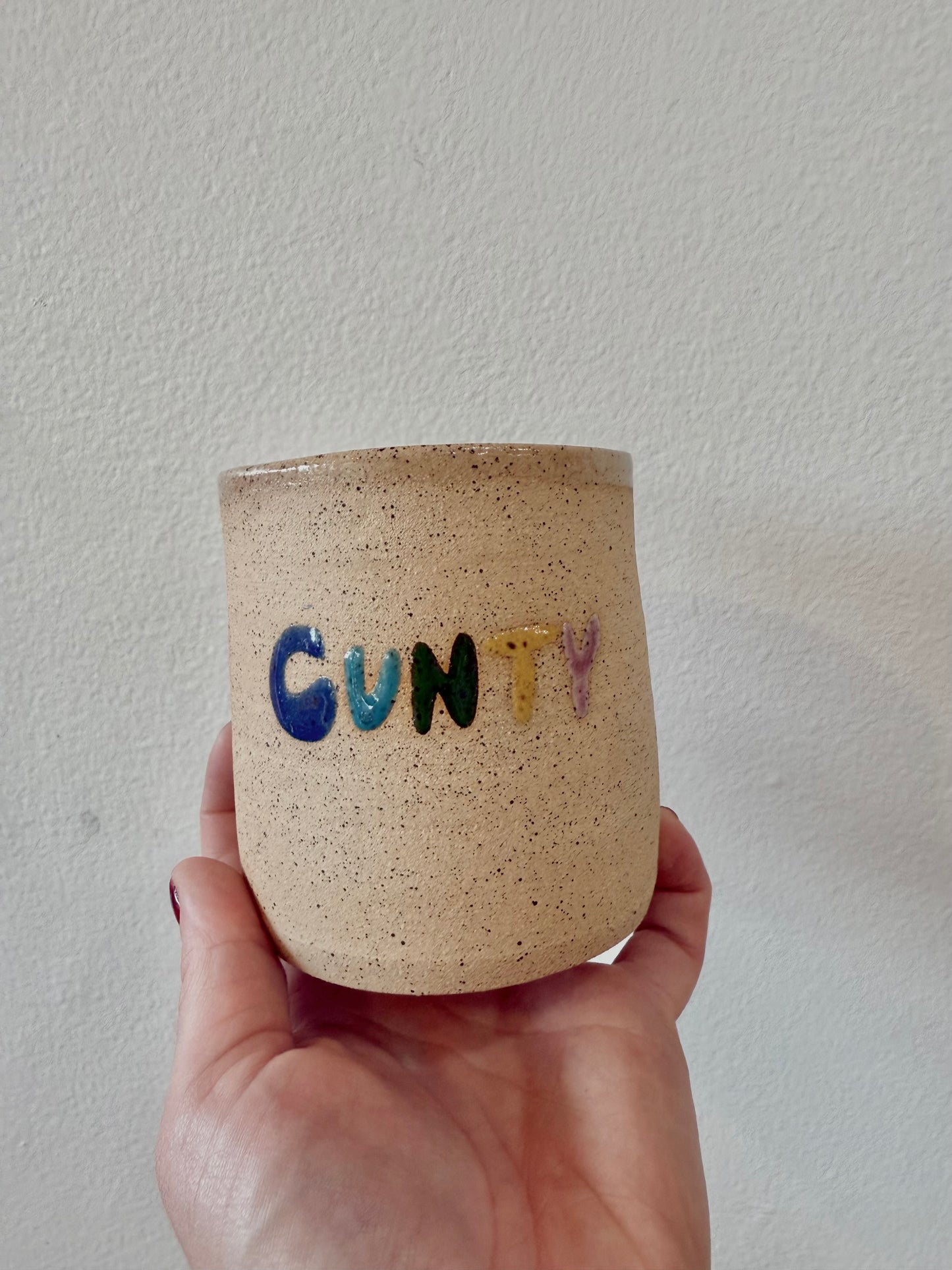 “C-U-N-T-Y" Cup
